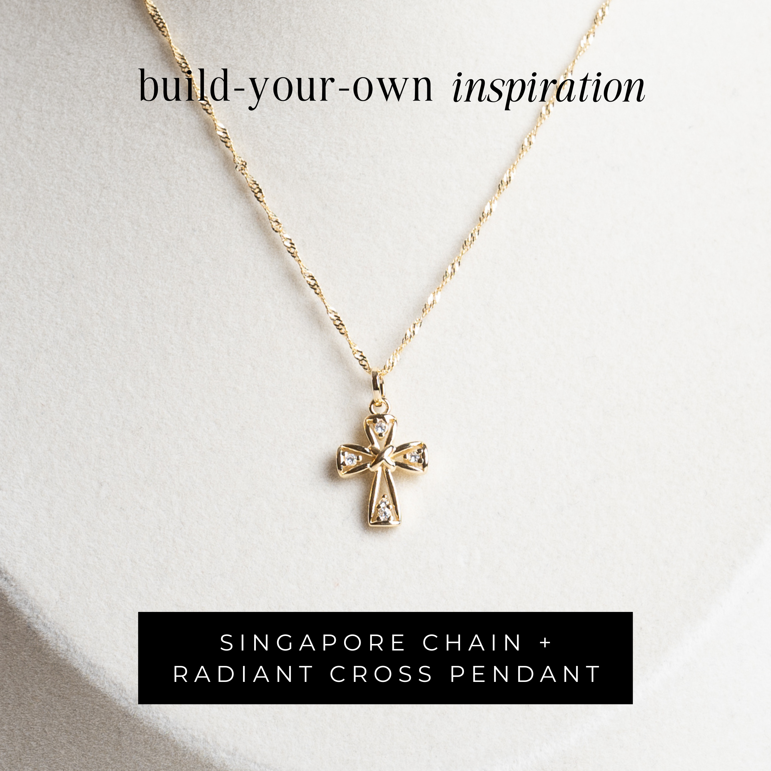 Gold necklace with cross pendant on a white background